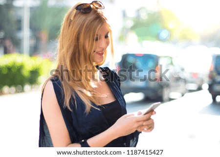 Similar – beautiful woman talking on the phone while laughing.