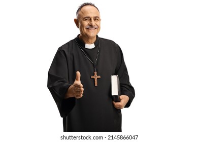 Happy Priest Gesturing Handshake And Holding A Bible Isolated On White Background