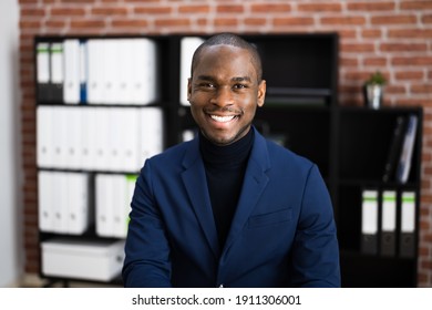 Happy Professional African American Employee In Office - Shutterstock ID 1911306001
