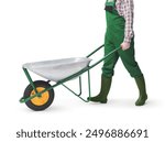 Happy professional gardener pushing an empty wheelbarrow, white background