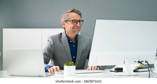 Happy Professional Man Employee Using Computer For Work