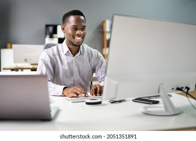 Happy Professional Man Employee Using Computer For Work - Powered by Shutterstock