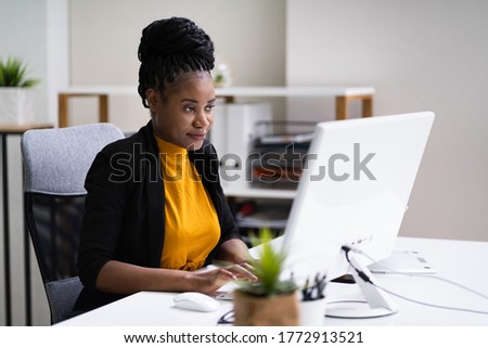Happy Professional Woman Employee Using Computer For Work