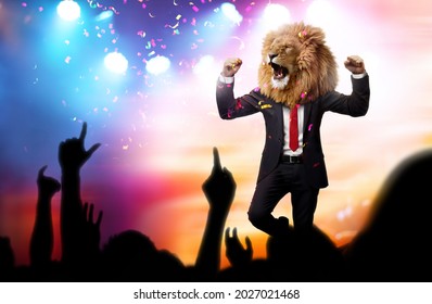 Happy proud man with a lion head in a business suit celebrating victory with crowd cheering. Business leader or famous celebrity conceptual theme.
