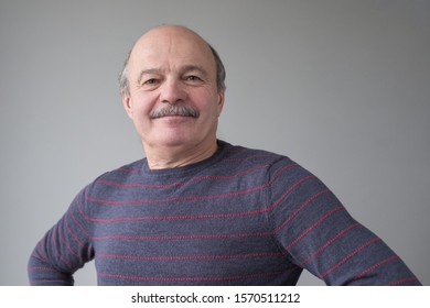 Happy Proud Mature Hispanic Man Looking At Camera. Studio Video