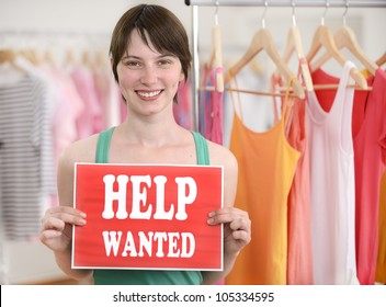 Happy Proud Owner Of Store With Help Wanted Sign