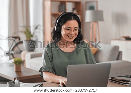 Happy, remote work and woman with a laptop for call center communication and consultation. Smile, virtual assistant and a customer service agent typing on a computer from a house for telemarketing