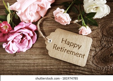 Happy retirement card with roses on rustic wooden board - Shutterstock ID 181974785