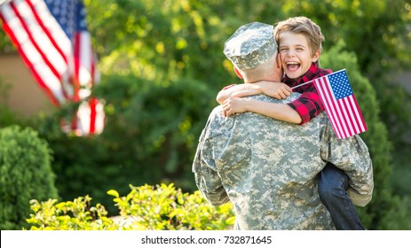 Happy reunion of soldier with family, son hug father - Shutterstock ID 732871645
