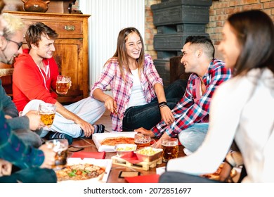 Happy Roommates Eating Take Away Pizza At Home After College - Friendship Concept With Young People Enjoying Time Together Having Genuine Fun At Shared Apartment - Focus On Young Woman In The Middle