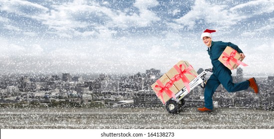 Happy Running Delivery Postman With Christmas Presents