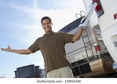 Happy Salesperson On RV Lot