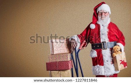 A happy Santa Claus delivering presents with trolley in a postal theme with a plain background and copy space.