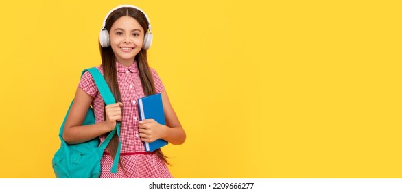 Happy School Teen Girl In Headphones Carry Backpack And Workbook, Elearning. Banner Of School Girl Student. Schoolgirl Pupil Portrait With Copy Space.