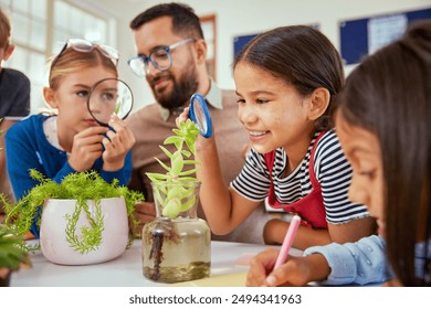 Happy schoolgirl exploring plants with magnifying glass in classroom. Teacher with multirthnic children in science class explaining plants biology. A group of schoolchildren sitting together and study - Powered by Shutterstock