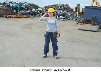 happy scrap yard manager posing - Powered by Shutterstock