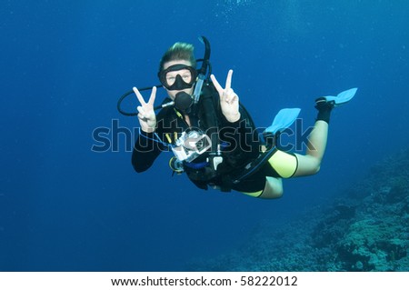 happy scuba divers