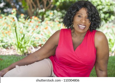 A Happy Senior African American Woman Outside Smiling.