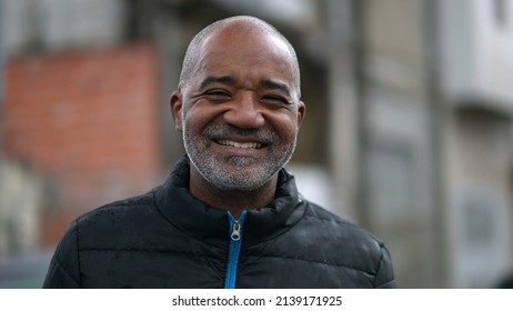 A Happy Senior Black Man Portrait Face Smiling At Camera Standing Outside In Street