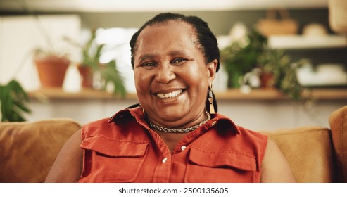 Happy, senior and black woman with portrait on sofa for relax in home for retirement, wellness and comfort. Elderly female person, smile and lounge in living room of house with peace on pension. - Powered by Shutterstock