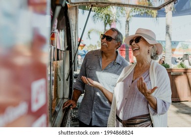 Happy senior couple enjoying their vacation - Powered by Shutterstock