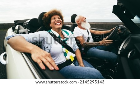 Image, Stock Photo man in driving car with arms out of the window