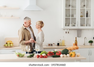 Happy Senior Couple In Love Celebrating Valentines Day At Home Together, Having Romantic Dinner