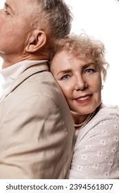 Happy senior couple in love. Close-up portrait in studio. - Shutterstock ID 2394561807