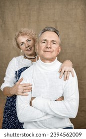 Happy senior couple in love. Close-up portrait in studio. - Shutterstock ID 2394562009