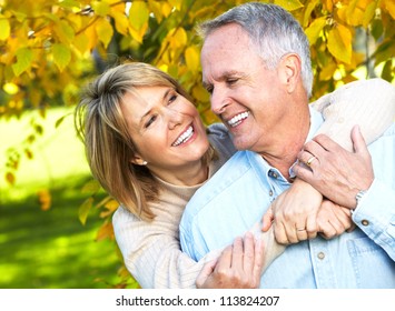 Happy Senior Couple In Love. Park Outdoors.