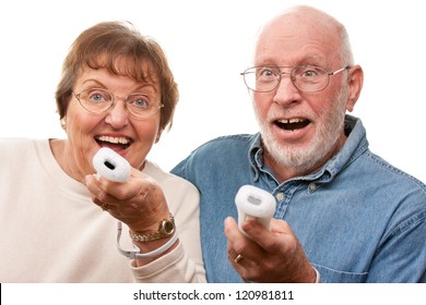 Happy Senior Couple Play Video Game with Remote Controls On a White Background.