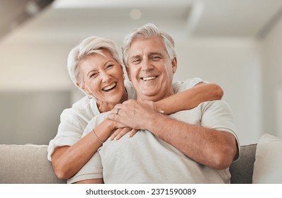 Happy senior couple, portrait and hug on living room sofa for embrace, relationship or love at home. Mature woman hugging man with smile in happiness for care, support or trust together in house - Powered by Shutterstock