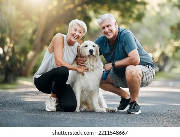 Happy senior couple, walking dog in nature park and smile bonding with their golden retriever together. Healthy living in retirement, being physically active by exercising and relaxing time with pet - Shutterstock ID 2211548667