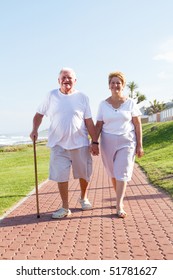 Happy Senior Couple Walking Outdoors