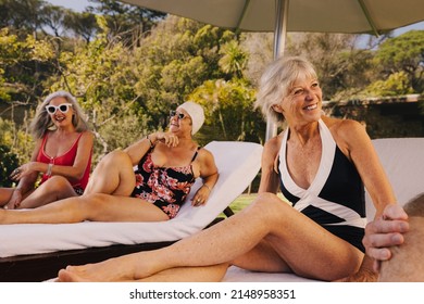 Happy Senior Friends Laughing And Having Fun On Vacation