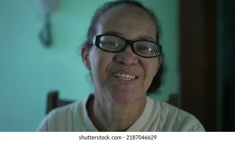 A Happy Senior Hispanic Older Woman Smiling At Camera. An Older South American Person Portrait