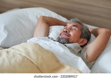 Happy Senior Man Asleep On The Bed,older Adult Asian Man Sleeping Comfortably In Blanket. Concept Elderly People Lifestyle, Get Enough Rest,health Care                               