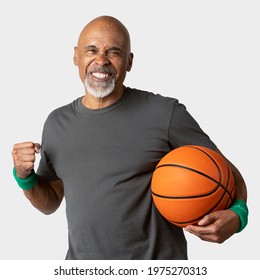 Happy Senior Man Holding A Basketball Mockup