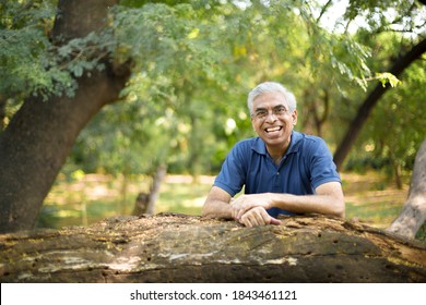 Happy Senior Man At Park 