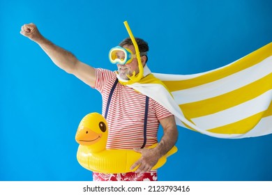 Happy senior man ready to travel. Summer vacation and holiday concept - Powered by Shutterstock