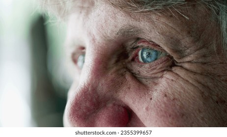 Happy senior man smiling, close-up macro detail of elderly person with wrinkles and blue eyes, expressing old age and wisdom while smiling - Powered by Shutterstock