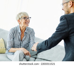 Happy Senior Old Family Couple Clients Make Financial Insurance Estate Business Deal Handshake Agent Lawyer, Satisfied Mature Customers Shake Hand Meeting Bank Manager Agree On Investment Contract