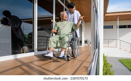 Happy Senior Patient With Doctor Outside Patients Room, Old Man On Wheelchair In Hospital, Doctor With Patient Portrait