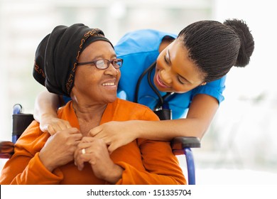 happy senior patient with friendly female nurse