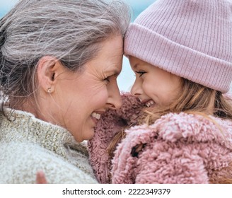 Happy Senior Woman, Family And Girl Spending Quality Time Together In The Park During Autumn. Cute Little Child And Her Grandmother Bonding Outdoor And Smile With Love, Care And Happiness In Winter