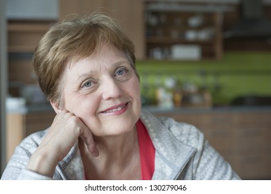 happy senior woman at home relaxing - Shutterstock ID 130279046