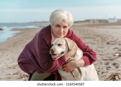 Happy Senior Woman Hugging Her Labrador Stock Photo 2169540587 ...