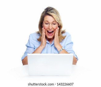 Happy Senior Woman With Laptop Computer. Isolated Over White Background.