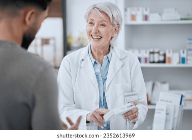 Happy senior woman, pharmacist and customer in consultation for medication or prescription at pharmacy. Mature female person, medical or healthcare employee consulting patient on pharmaceutical drugs - Powered by Shutterstock