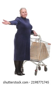 Happy Senior Woman With A Shopping Cart With Arm Up